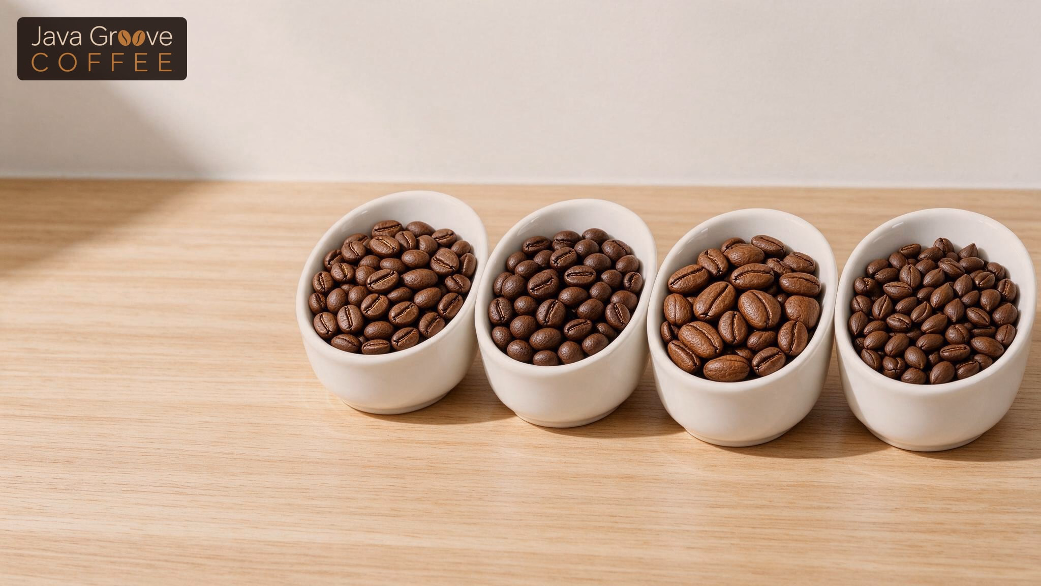 Types of coffee beans: four bowls of roasted coffee beans