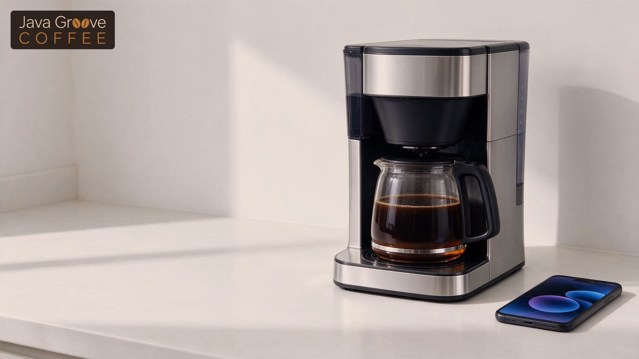 Best smart coffee makers: a drip maker next to a smartphone
