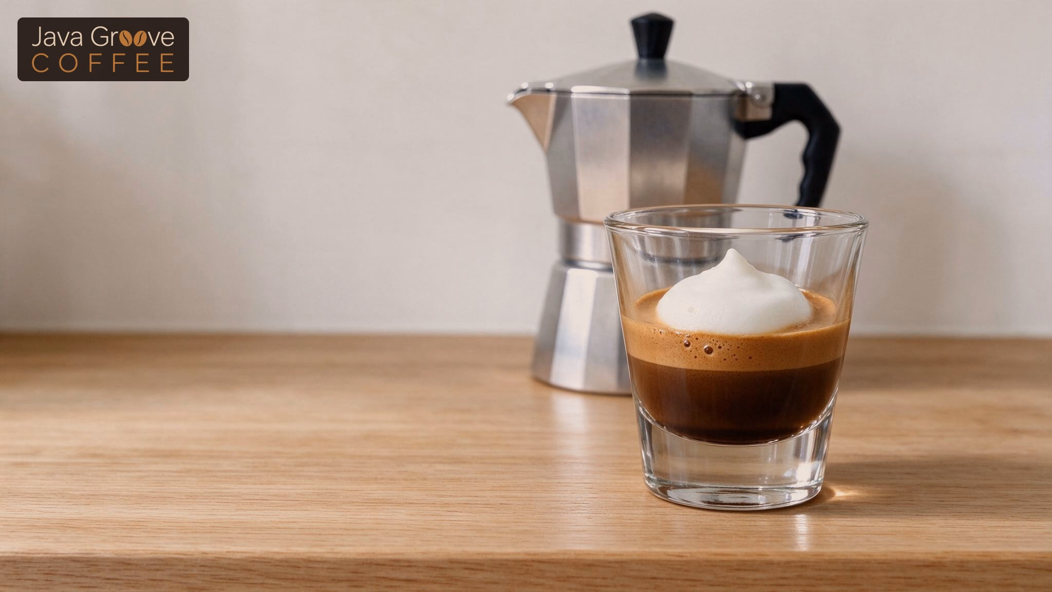Macchiato without an espresso machine: moka pot espresso topped with milk foam