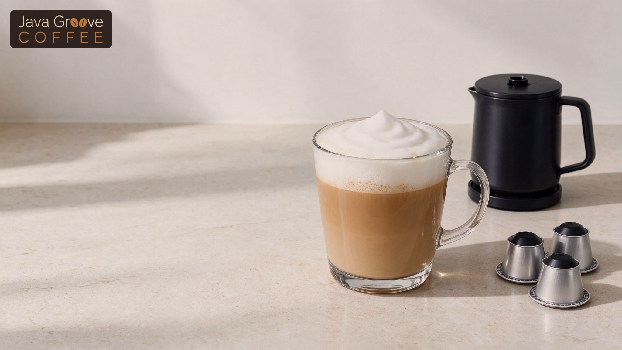 Nespresso machines with frother: a latte beside a milk frother and capsules
