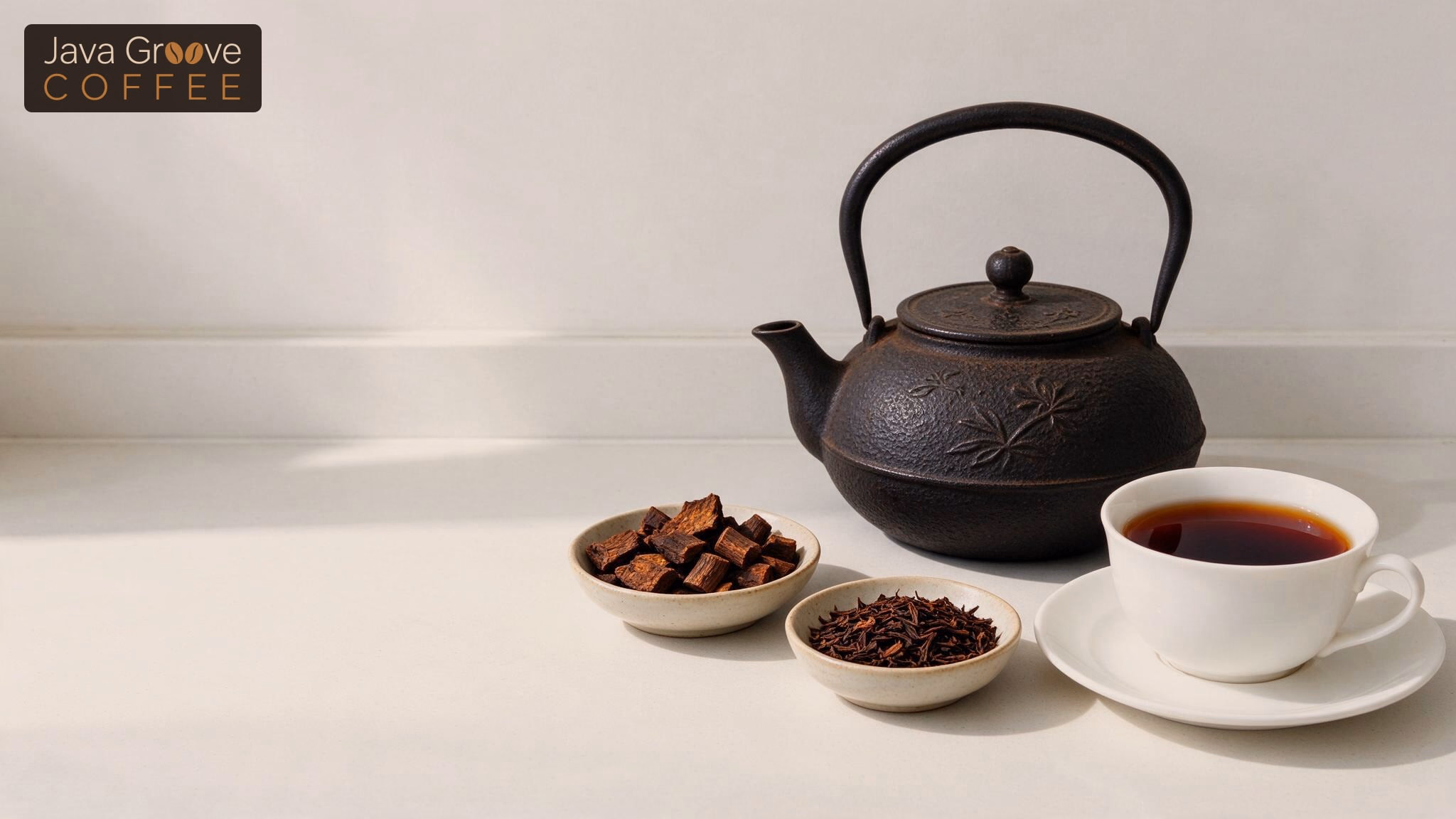 Teas that taste like coffee, dark roasted tea beside a cast iron teapot