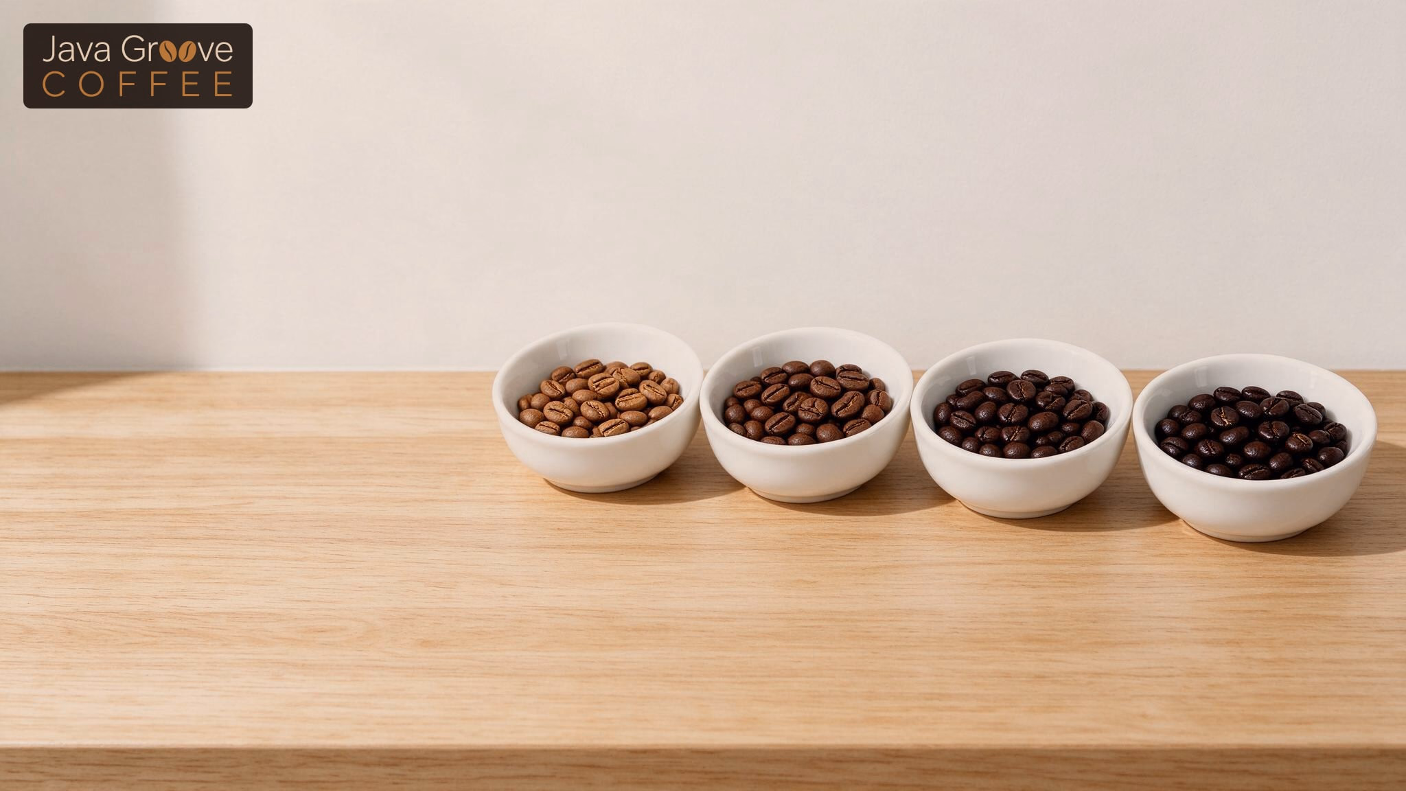 Coffee bean types: bowls of beans from light to dark roast