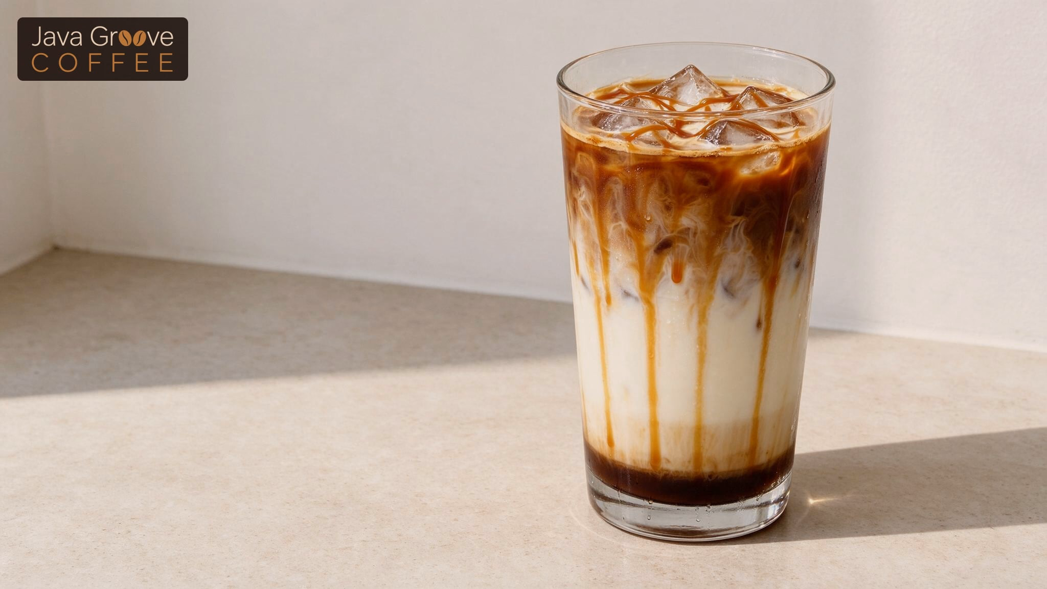 Upside down caramel macchiato in a tall iced glass